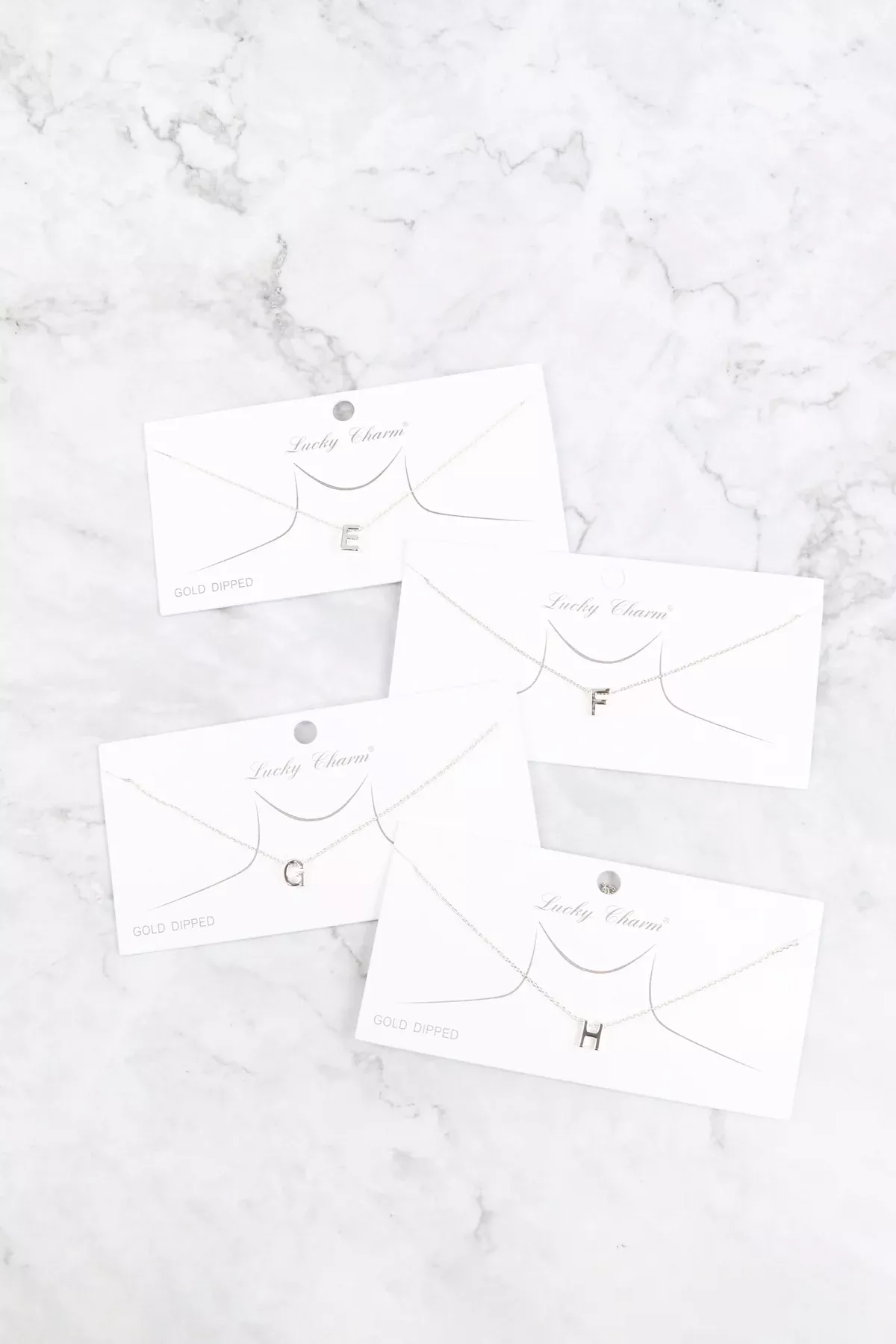 "F" INITIAL DAINTY CHARM NECKLACE