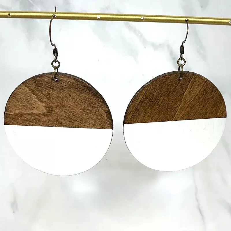 white dipped wooden circle earrings